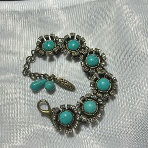Plunder bracelet with turquoise color stones, brass gold tone 6 1/2 to 8 inch